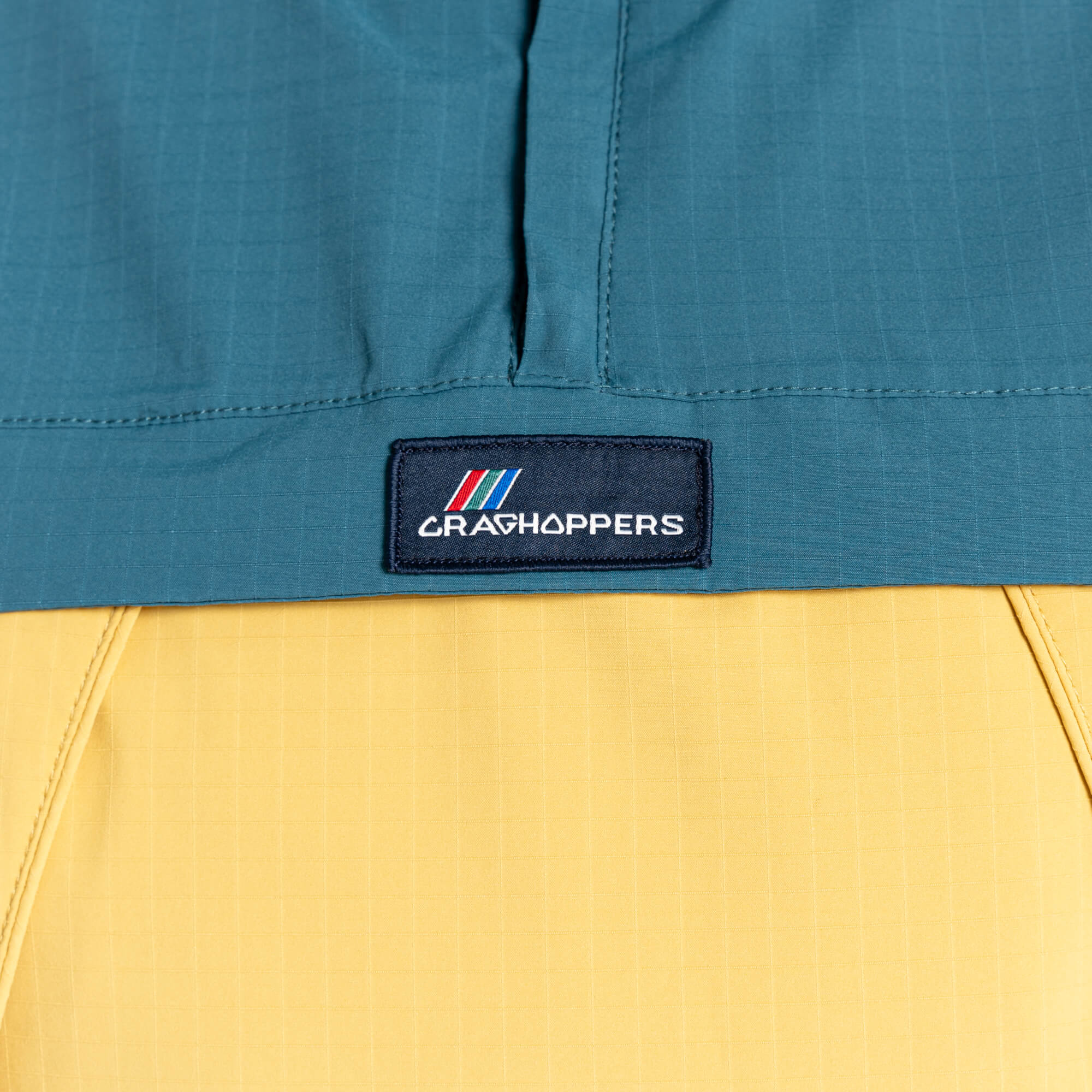 Unisex Anderson Waterproof Cagoule - Sacramento Green/Sunrise Yellow